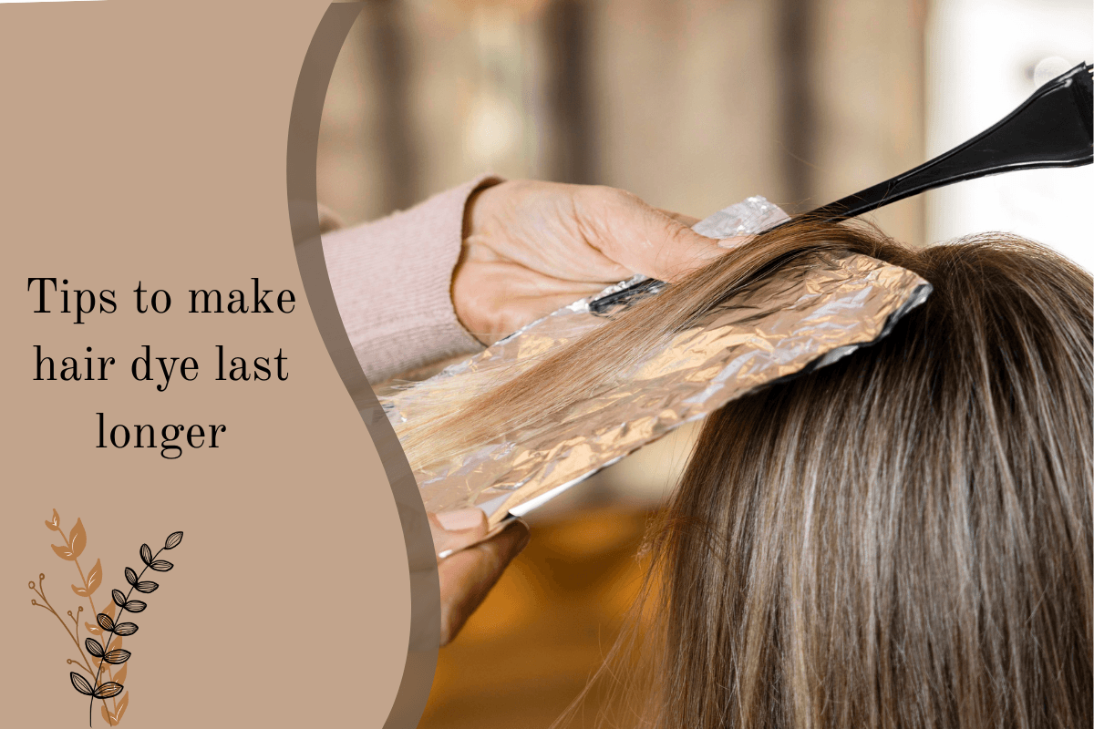 A stylist applying hair dye with foil and brush, showing professional tips on how to make hair dye last longer.